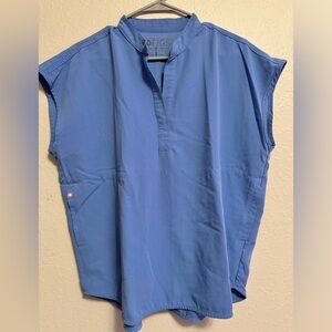 Figs Rafaela oversized scrub top in Ciel blue.